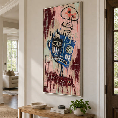 Gentle Passage graffiti figure wall art with a silver frame in an entryway