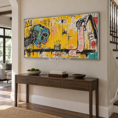 Gentle Solace graffiti figure wall art with a silver frame in an entryway