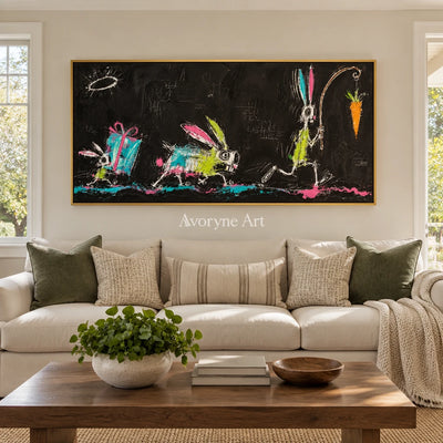 Open Passage graffiti figure wall art with a gold frame hanging in a living room