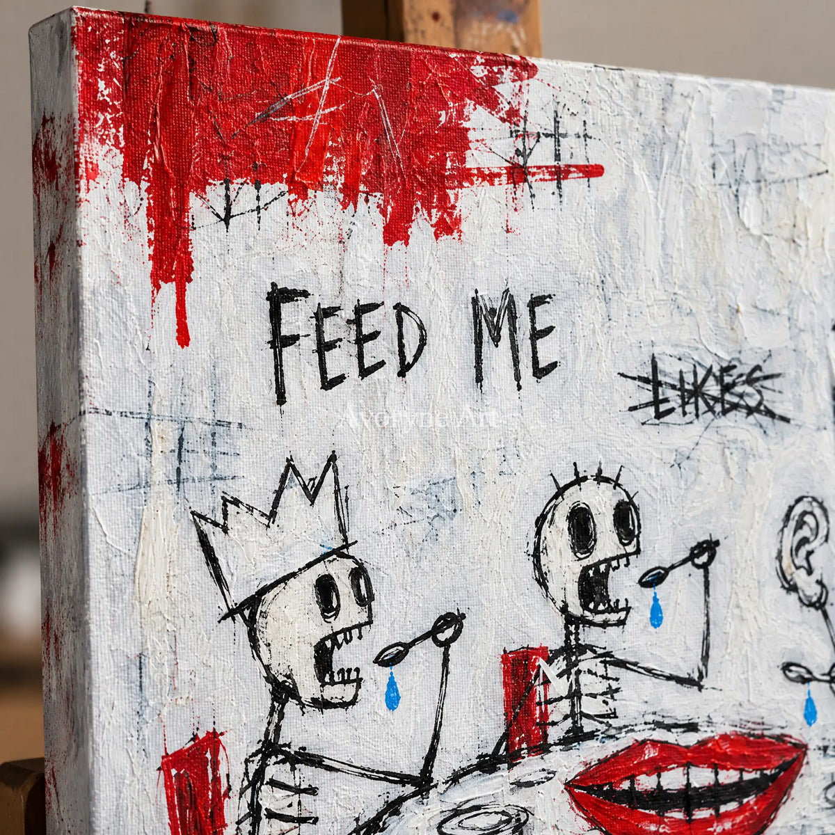 Close-up of the hand-painted texture of Open Story graffiti figure wall art on an easel
