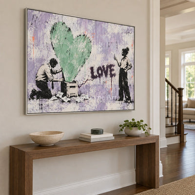 Distant Verse graffiti figure wall art with a silver frame in an entryway