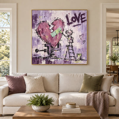 Distant Prelude graffiti figure wall art with a gold frame hanging in a living room