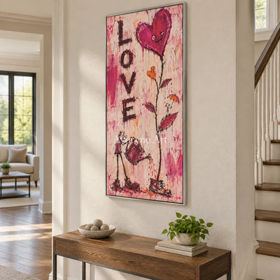 Distant Story graffiti figure wall art with a silver frame in an entryway