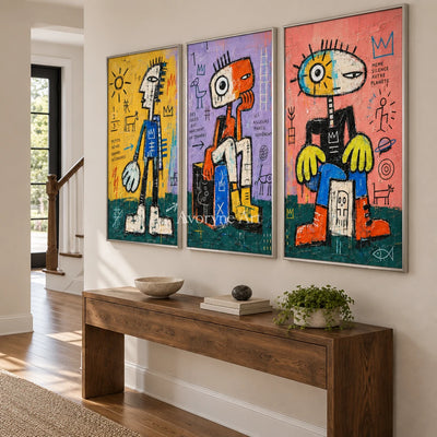 Soft Trace graffiti figure triptych with a silver frame in an entryway