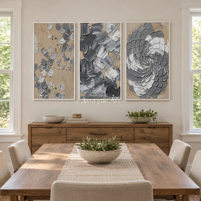 Mineral Trace gray curl relief triptych with a white frame in a dining room