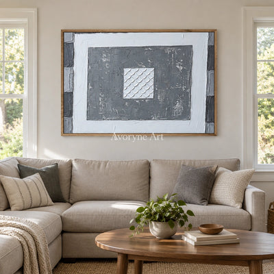 Hushed Mosaic gray scale relief wall art with a wood frame in a villa living space