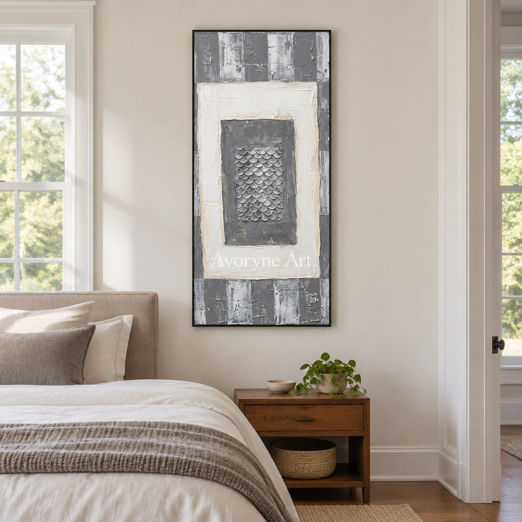 Hushed Memory gray scale relief wall art with a black frame above a bed in a bedroom