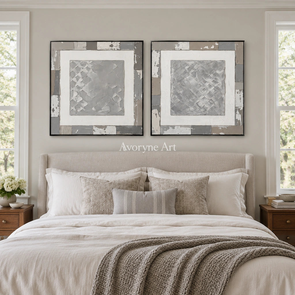 Soft Haven gray scale relief diptych with a black frame above a bed in a bedroom