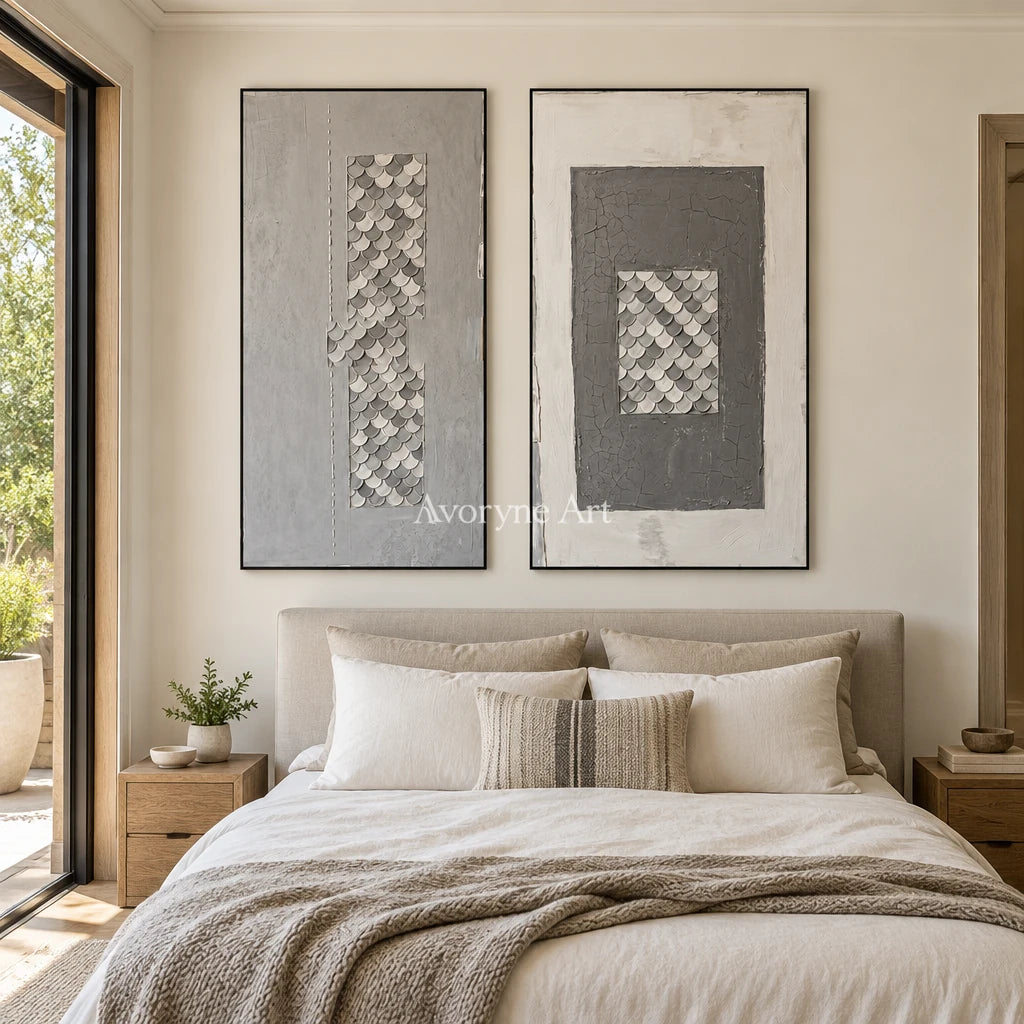 Hushed Reverie gray scale relief diptych with a black frame above a bed in a bedroom
