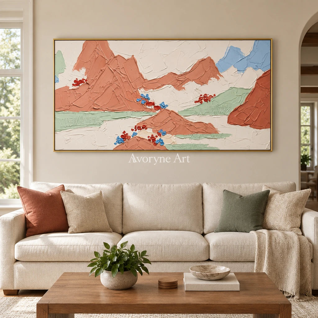 Restful Trace green mountain wall art with a gold frame hanging in a living room