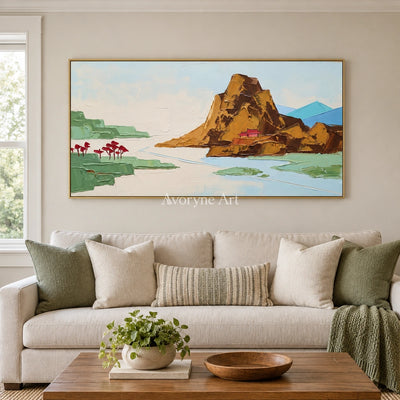 Restful Vista green mountain wall art with a gold frame hanging in a living room
