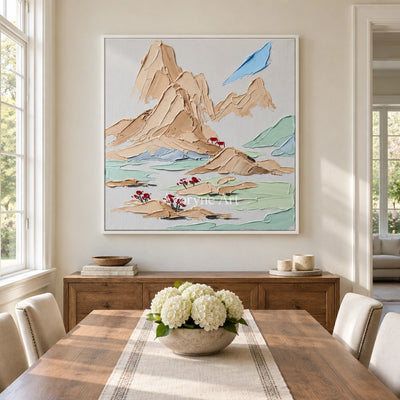 Restful Current green mountain wall art with a white frame in a dining room