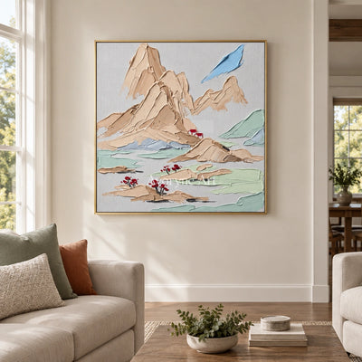 Restful Current green mountain wall art with a gold frame hanging in a living room