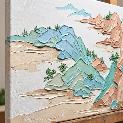 Close-up of the hand-painted texture of Restful Reverberation green mountain wall art on an easel