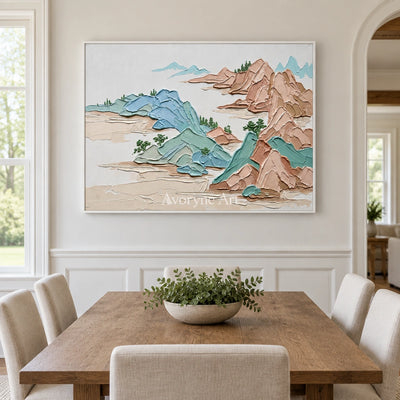 Restful Reverberation green mountain wall art with a white frame in a dining room