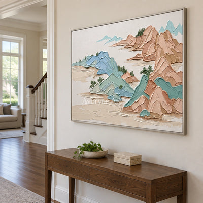 Restful Reverberation green mountain wall art with a silver frame in an entryway