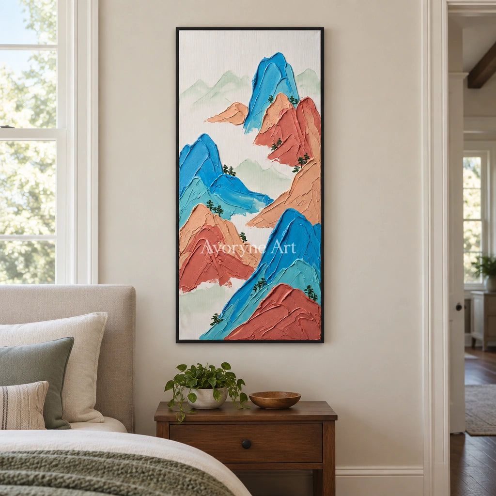 Restful Dialogue green mountain wall art with a black frame above a bed in a bedroom
