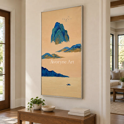 Faint Passage green mountain wall art with a silver frame in an entryway