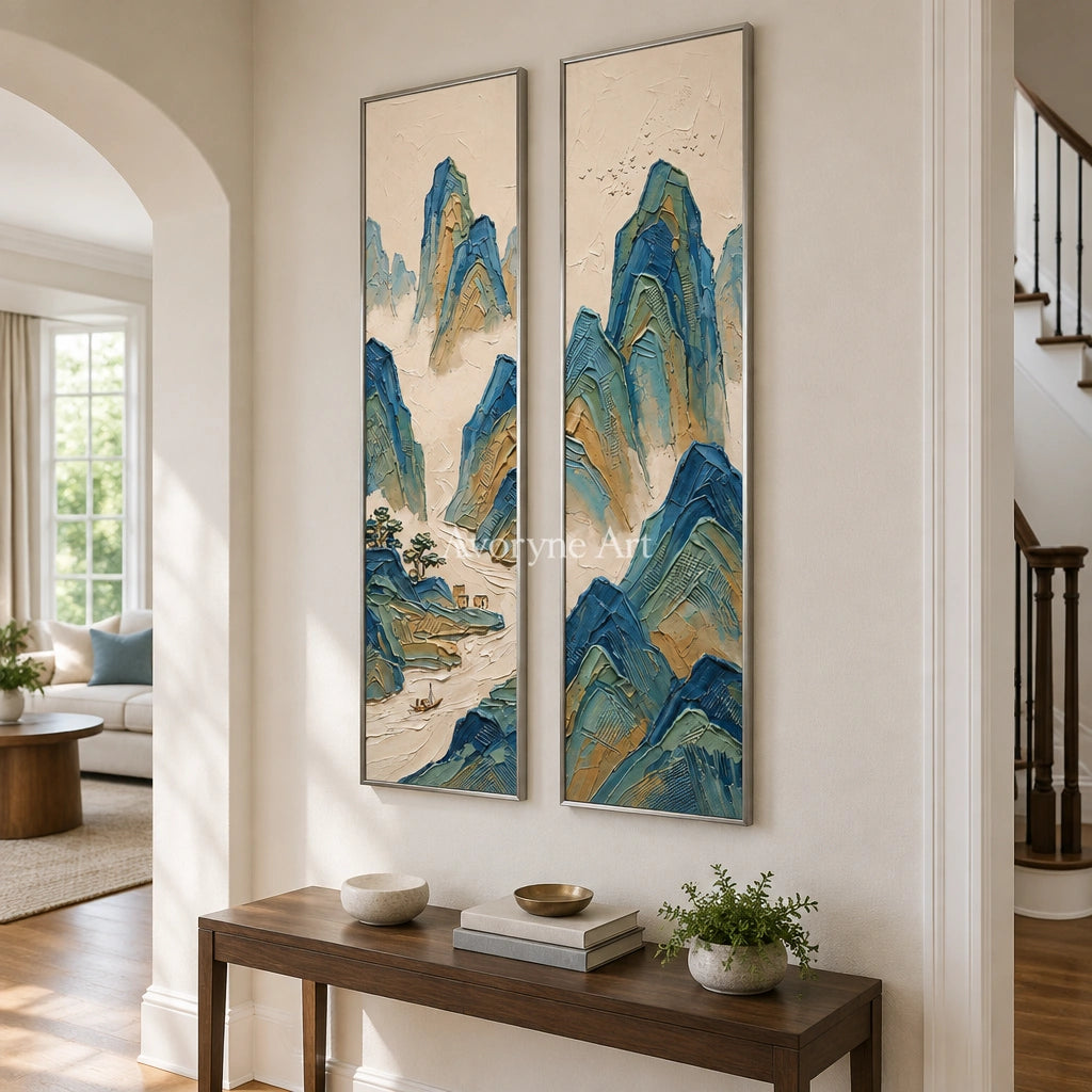 Faint Interval green mountain diptych with a silver frame in an entryway