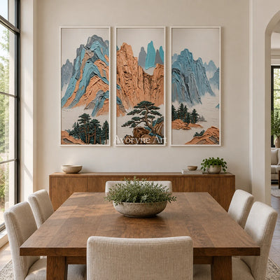 Faint Echo green mountain triptych with a white frame in a dining room
