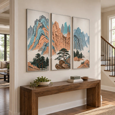 Faint Echo green mountain triptych with a silver frame in an entryway