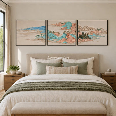 Faint Mosaic green mountain triptych with a black frame above a bed in a bedroom