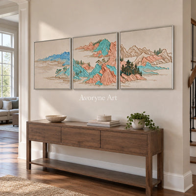 Faint Mosaic green mountain triptych with a silver frame in an entryway