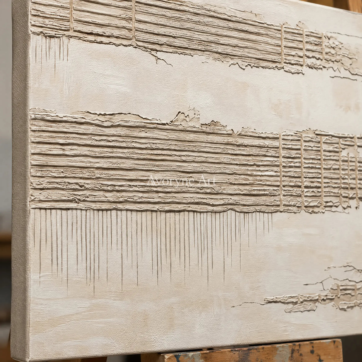 Close-up of the hand-painted texture of Amber Reverie grooved texture wall art on an easel