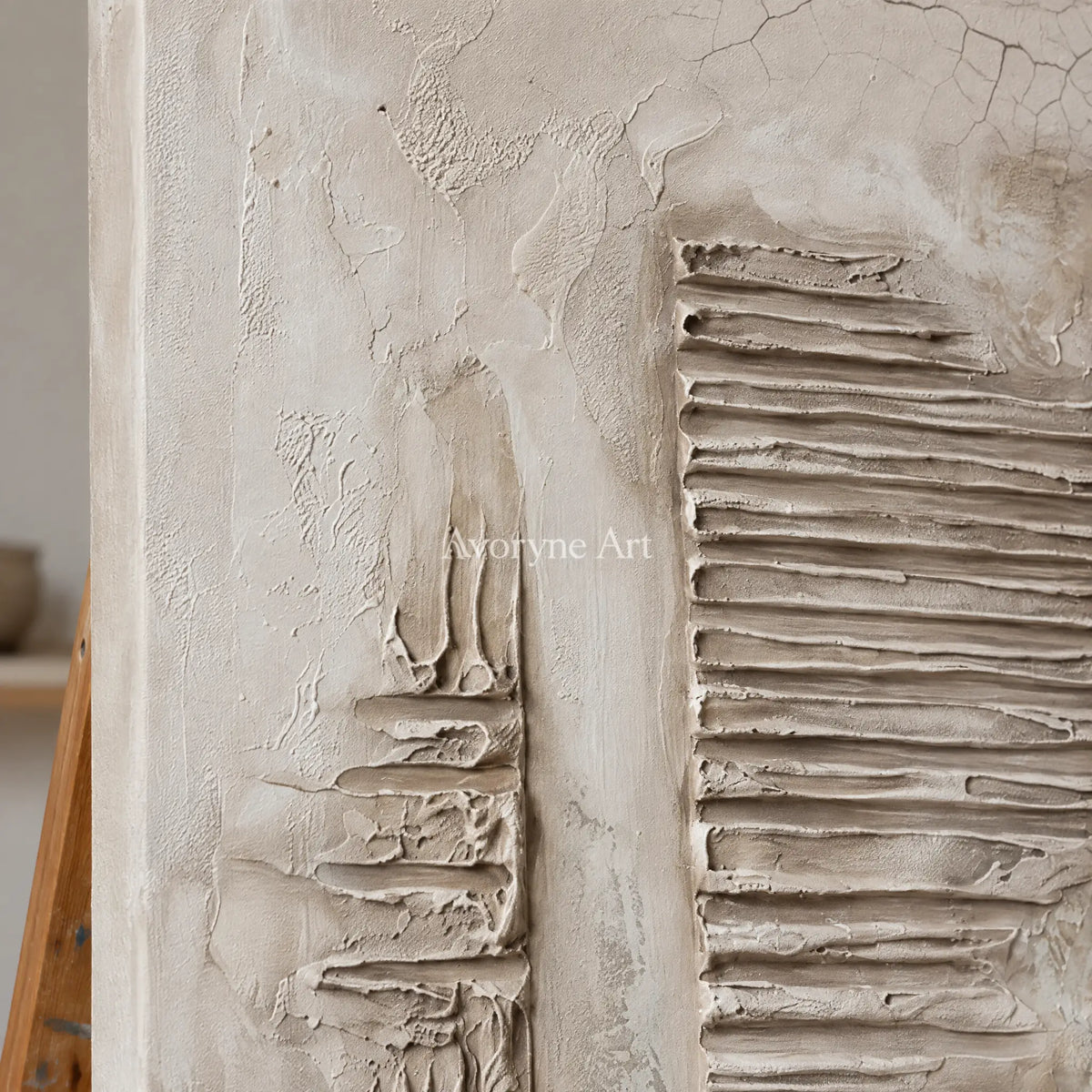 Close-up of the hand-painted texture of Amber Gesture grooved texture wall art on an easel