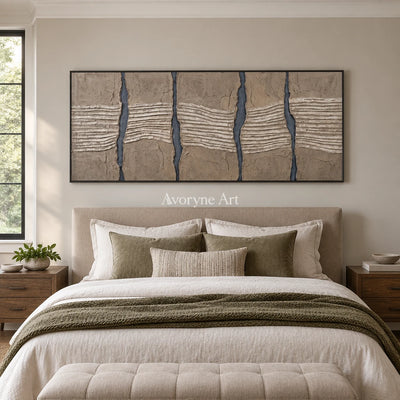 Amber Memory grooved texture wall art with a black frame above a bed in a bedroom