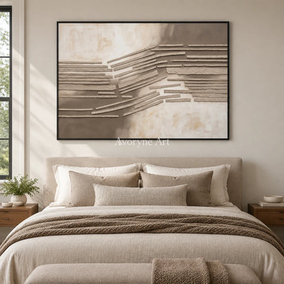 Soft Drift grooved texture wall art with a black frame above a bed in a bedroom