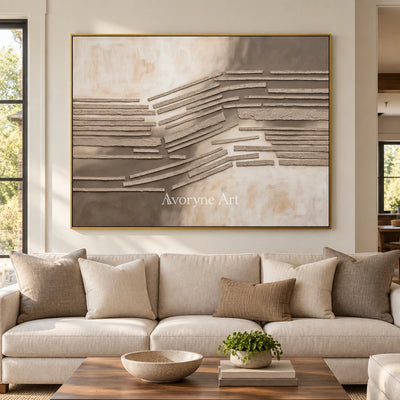 Soft Drift grooved texture wall art with a gold frame hanging in a living room