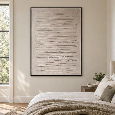 Soft Memory grooved texture wall art with a black frame above a bed in a bedroom