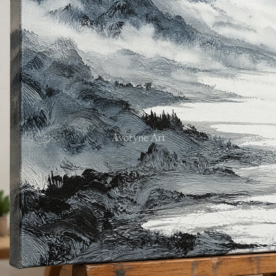 Close-up of the hand-painted texture of Pale Haven ink mountain water wall art on an easel
