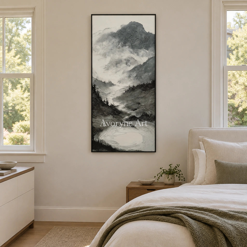 Pale Field ink mountain water wall art with a black frame above a bed in a bedroom