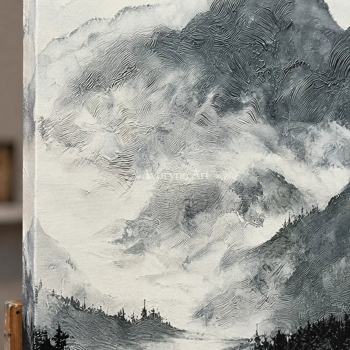Close-up of the hand-painted texture of Pale Field ink mountain water wall art on an easel