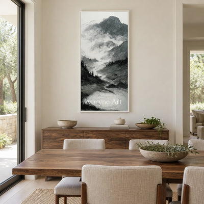 Pale Field ink mountain water wall art with a white frame in a dining room