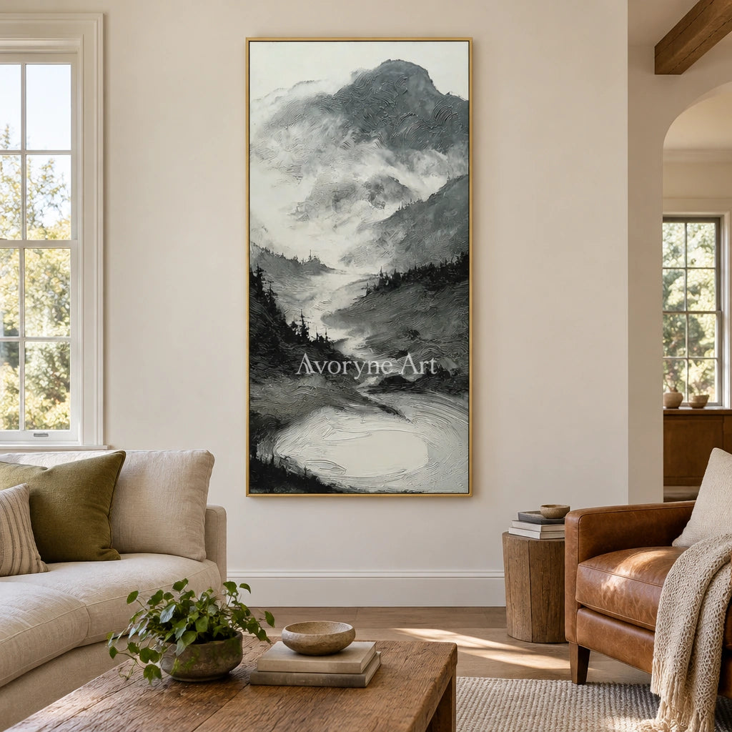 Pale Field ink mountain water wall art with a gold frame hanging in a living room