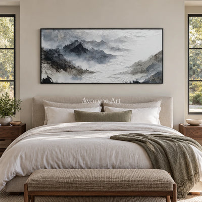 Pale Sonata ink mountain water wall art with a black frame above a bed in a bedroom