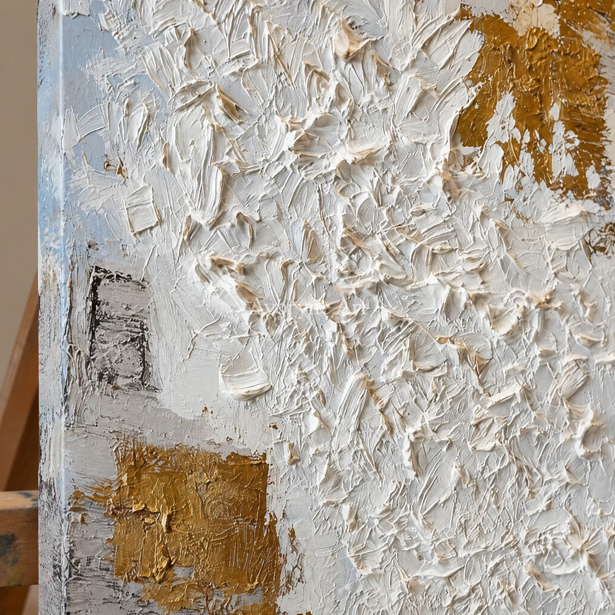 Close-up of the hand-painted texture of Lucent Measure ivory curl relief wall art on an easel