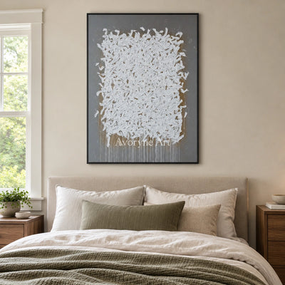 Lucent Field ivory curl relief wall art with a black frame above a bed in a bedroom