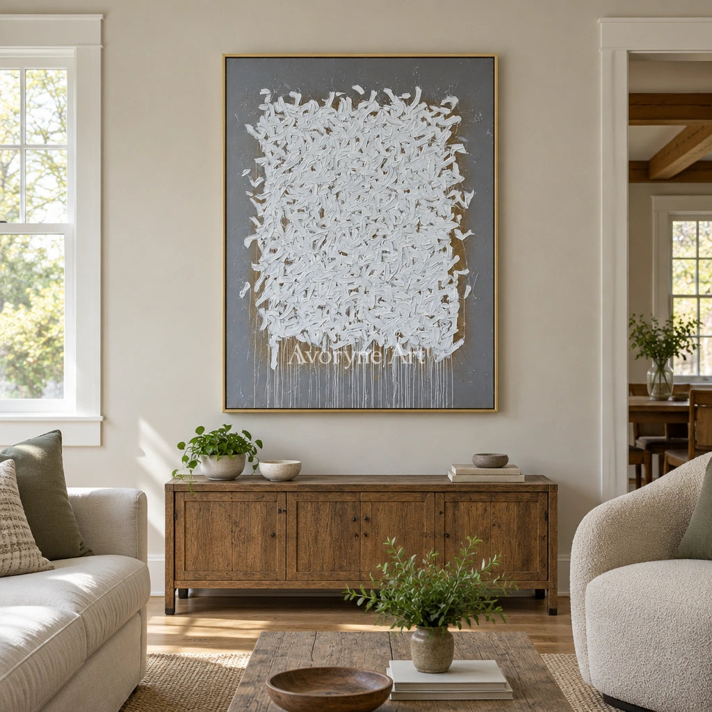 Lucent Field ivory curl relief wall art with a gold frame hanging in a living room