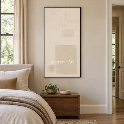 Woven Gesture ivory geometric art with a black frame above a bed in a bedroom
