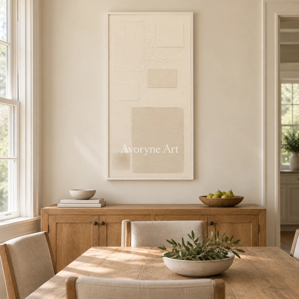 Woven Gesture ivory geometric art with a white frame in a dining room