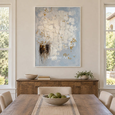 Gentle Haven ivory gold relief wall art with a white frame in a dining room