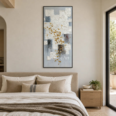 Lucent Refrain ivory gold relief wall art with a black frame above a bed in a bedroom