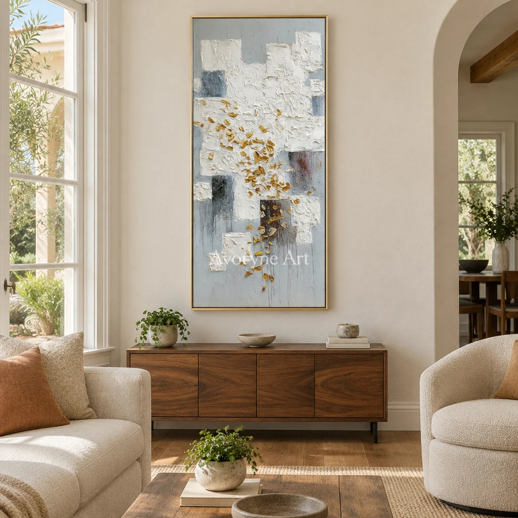 Lucent Refrain ivory gold relief wall art with a gold frame hanging in a living room