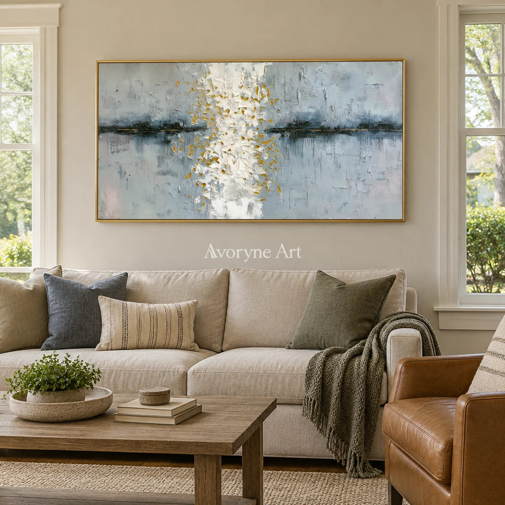 Lucent Haven ivory gold relief wall art with a gold frame hanging in a living room