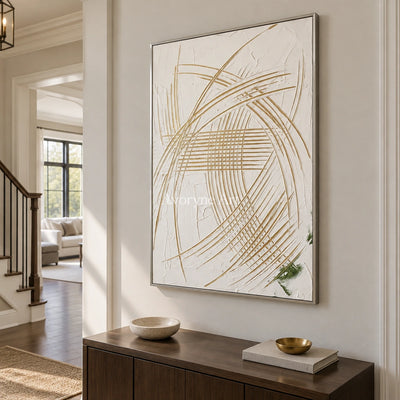 Silver Reverberation linear abstract wall art with a silver frame in an entryway