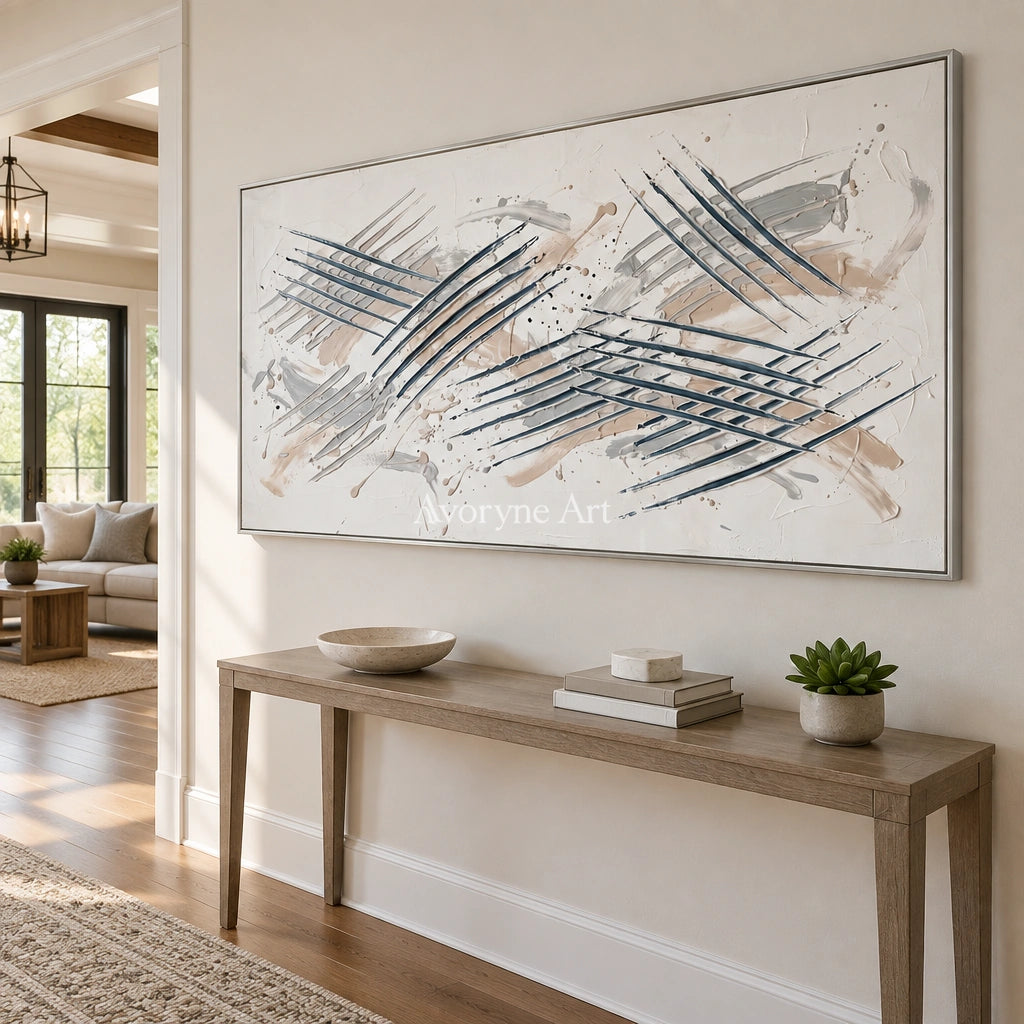 Golden Cadence linear abstract wall art with a silver frame in an entryway